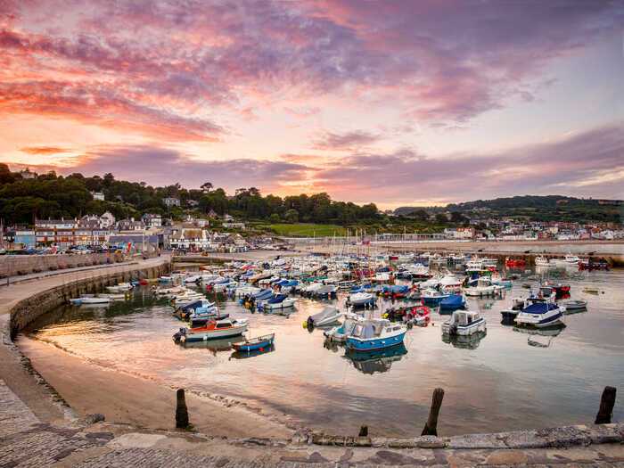 lyme regis harbour at dusk